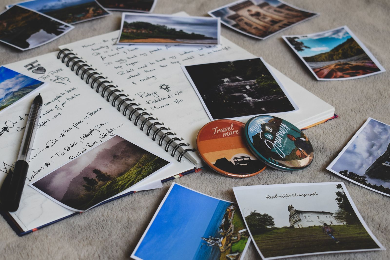 Travel journal with handwritten notes and printed trip photos
